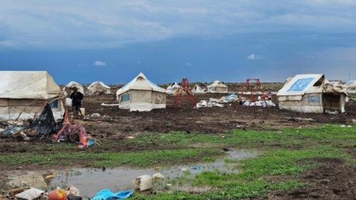 Mud covers the ground around tents at the Abu Al-Naja camp for displaced Sudanese in the eastern ... Mud covers the ground around tents at the Abu Al-Naja camp for displaced Sudanese in the eastern ...