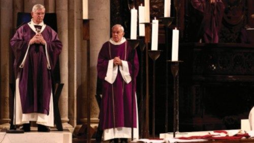 Archbishop of Paris, Laurent Ulrich (C) presides over the funeral ceremony of France's late Cardinal ...