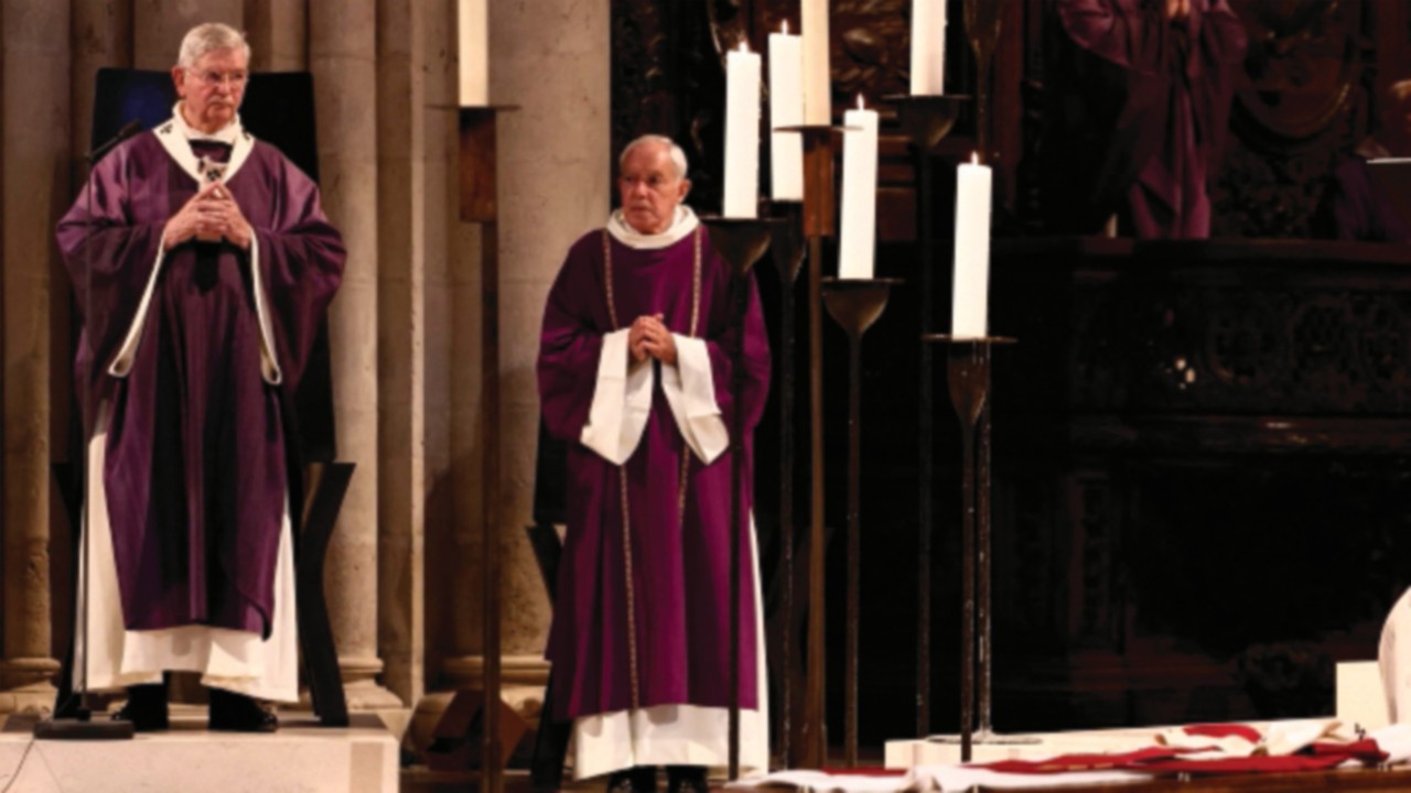 Archbishop of Paris, Laurent Ulrich (C) presides over the funeral ceremony of France's late Cardinal ...