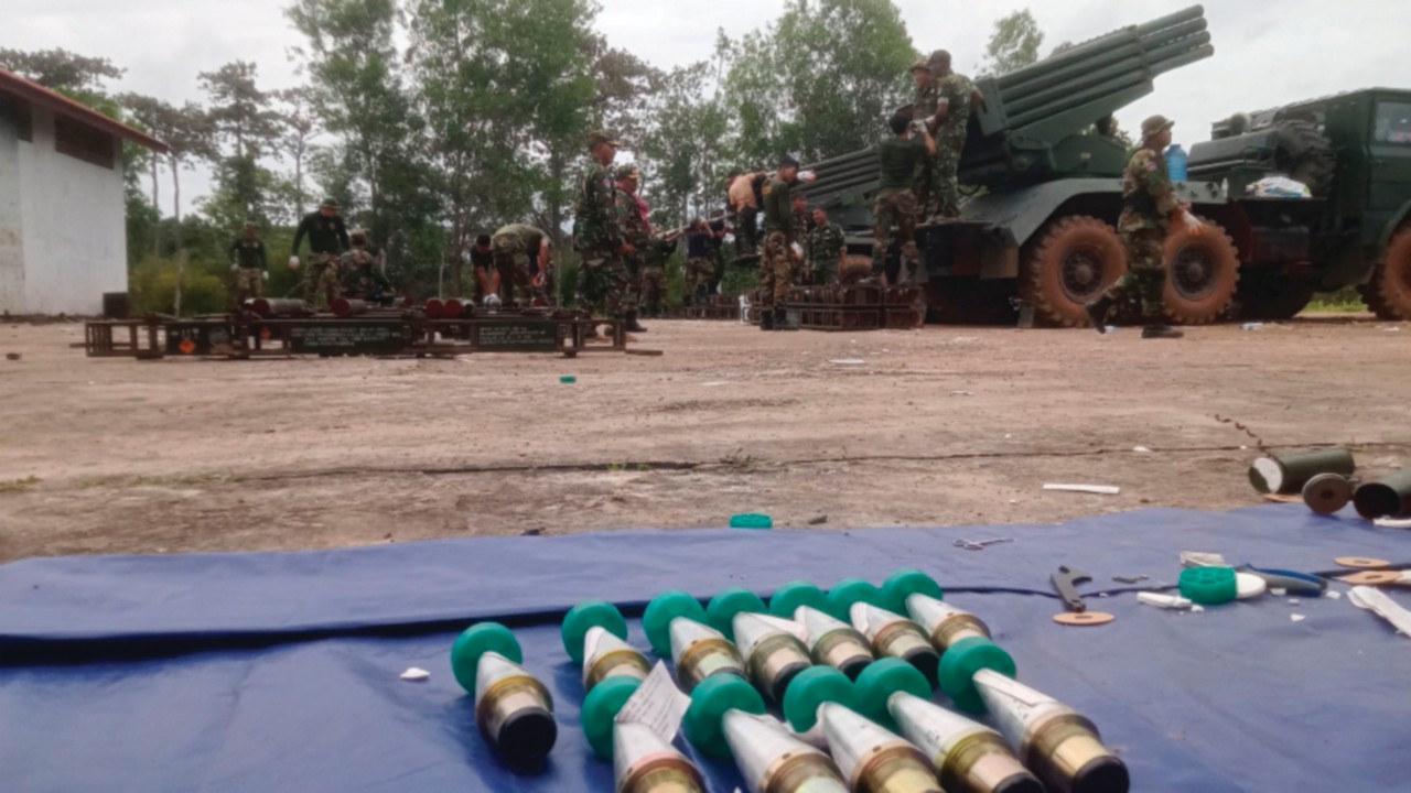 Cambodian soldiers reload the BM-21 multiple rocket launcher in Preah Vihear province on July 24, ...