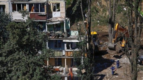 A view shows an apartment building that was hit a day before by a Russian missile strike, amid ...