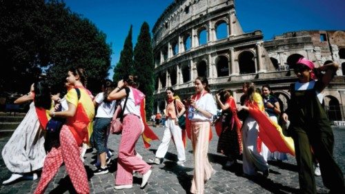 Young people, faithful and pilgrims walk away from the Colosseum during the Vatican's Jubilee of ... Young people, faithful and pilgrims walk away from the Colosseum during the Vatican's Jubilee of ...