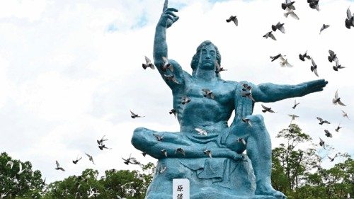 Doves fly during a ceremony marking the 75th anniversary of the atomic bombing of Nagasaki, at the ...