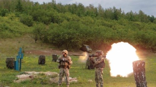 Service members of the 58th Separate Motorized Infantry Brigade of the Ukrainian Armed Forces use an ...