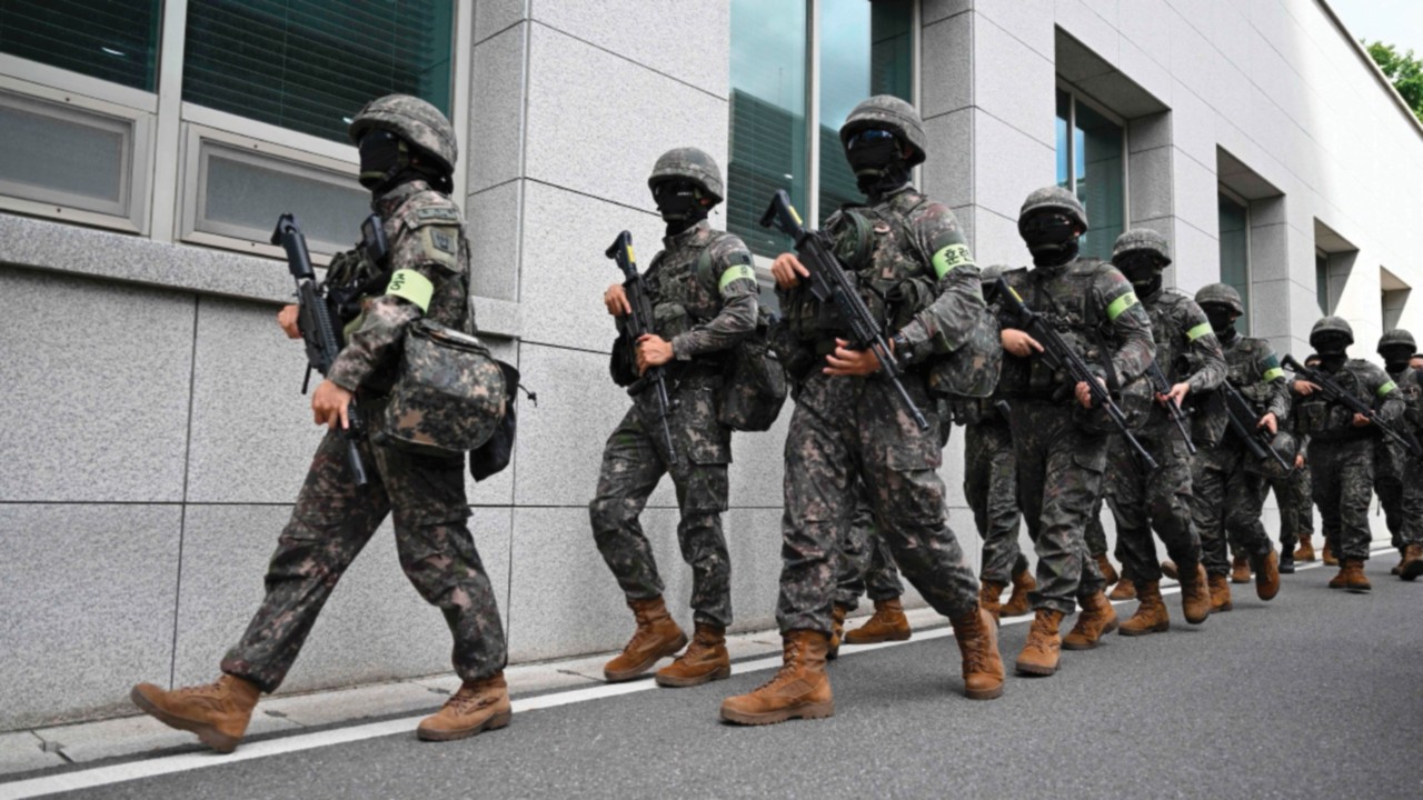 South Korean soldiers take part in an anti-terror drill at the Foreign Ministry building in Seoul on ...