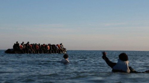 A group of migrants on an inflatable dinghy leave the coast of northern France in an attempt to ... A group of migrants on an inflatable dinghy leave the coast of northern France in an attempt to ...