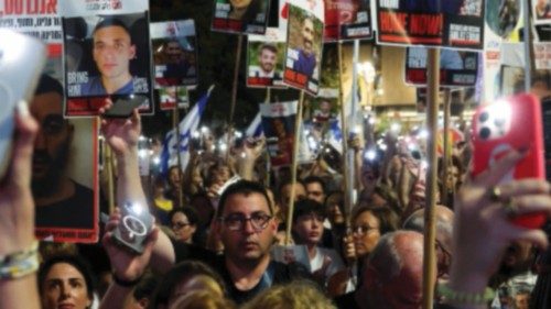 Protesters take part in a rally to demand the immediate end of the war in Gaza and the release of ... Protesters take part in a rally to demand the immediate end of the war in Gaza and the release of ...
