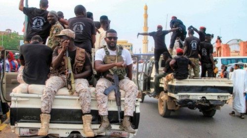 Sudanese army soldiers take part in a military parade as part of religious commemorations by Muslim ... Sudanese army soldiers take part in a military parade as part of religious commemorations by Muslim ...