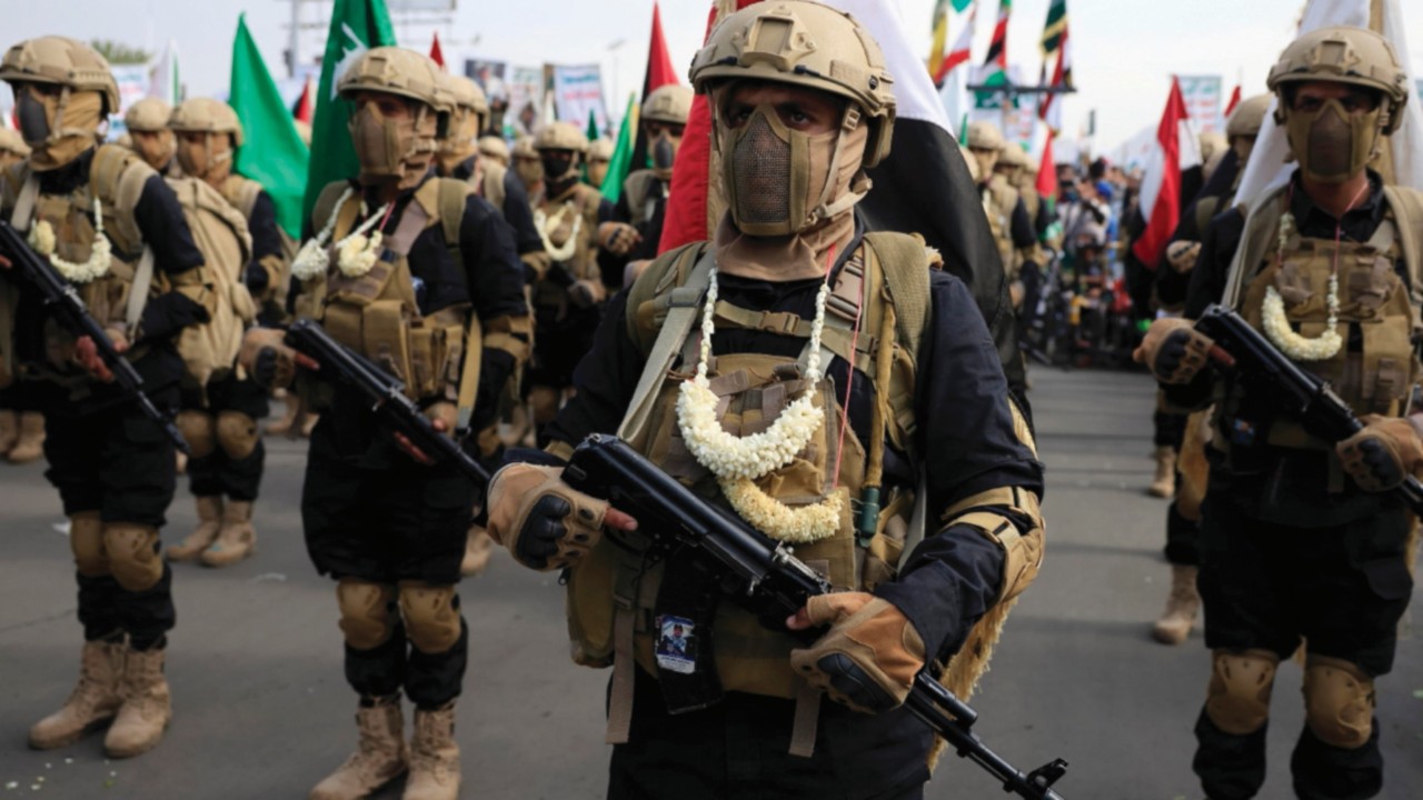 epa12334902 Houthi fighters wearing jasmine necklaces participate in a protest against Israel in ...