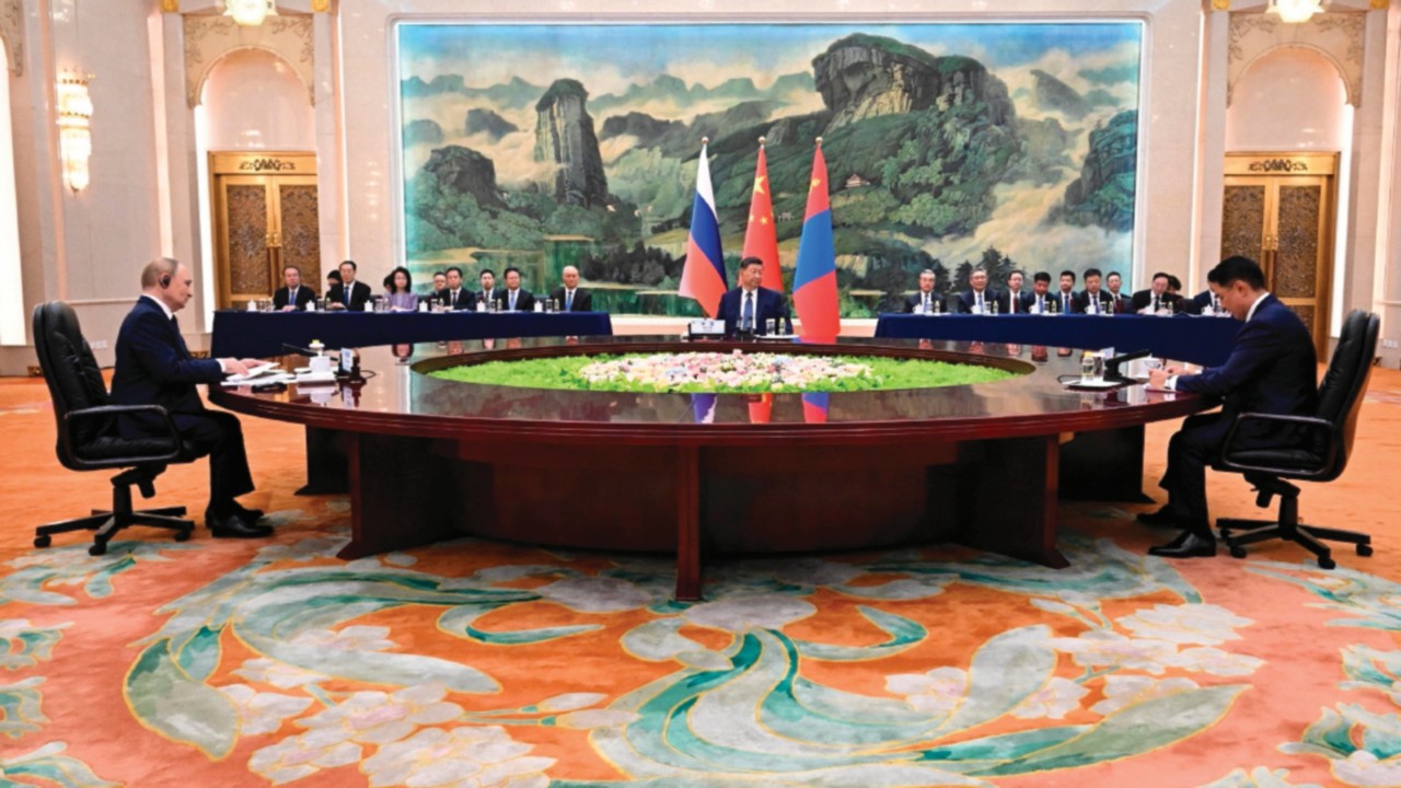 epa12344855 (L-R) Russian President Vladimir Putin, Chinese President Xi Jinping and Mongolian ...