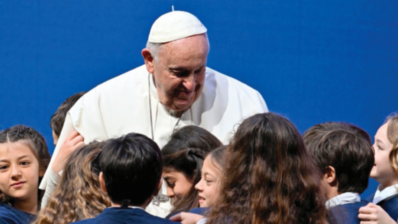 Pope Francis greets children during a two-day 'General States of Birth' conference in Rome on May ...