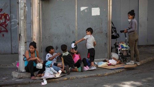 epa08933236 A group of people waiting for donations, in Caracas Venezuela, 06 January 2021 (issued ...