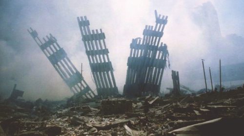 FILE - In this Sept. 11, 2001 file photo, the remains of the World Trade Center stands amid the ...