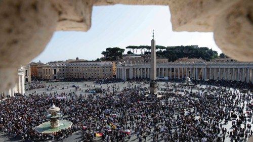 People gather at Saint Peter's Square for Angelus prayer led by Pope Francis from his window at the ...