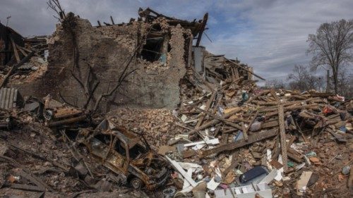 epa09856742 Destroyed buildings that were shelled by Russian forces, in Kharkiv, northeast Ukraine, ...