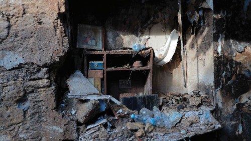 This photograph taken on February 24, 2024 shows religious icons in a damaged residential building ... This photograph taken on February 24, 2024 shows religious icons in a damaged residential building ...