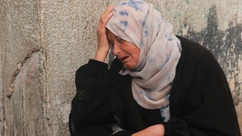 A Palestinian woman mourns the death of a loved one at Al-Najjar hospital following overnight ... A Palestinian woman mourns the death of a loved one at Al-Najjar hospital following overnight ...
