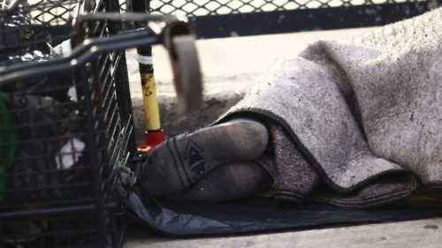 A homeless person sleeps outside a train station in Buenos Aires, Argentina, May 30, 2024. ... A homeless person sleeps outside a train station in Buenos Aires, Argentina, May 30, 2024. ...